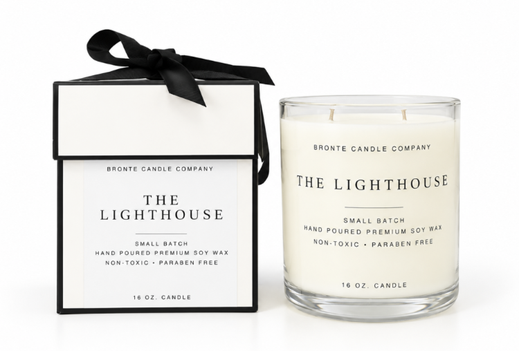 The Lighthouse candle and ribbon-tied presentation box